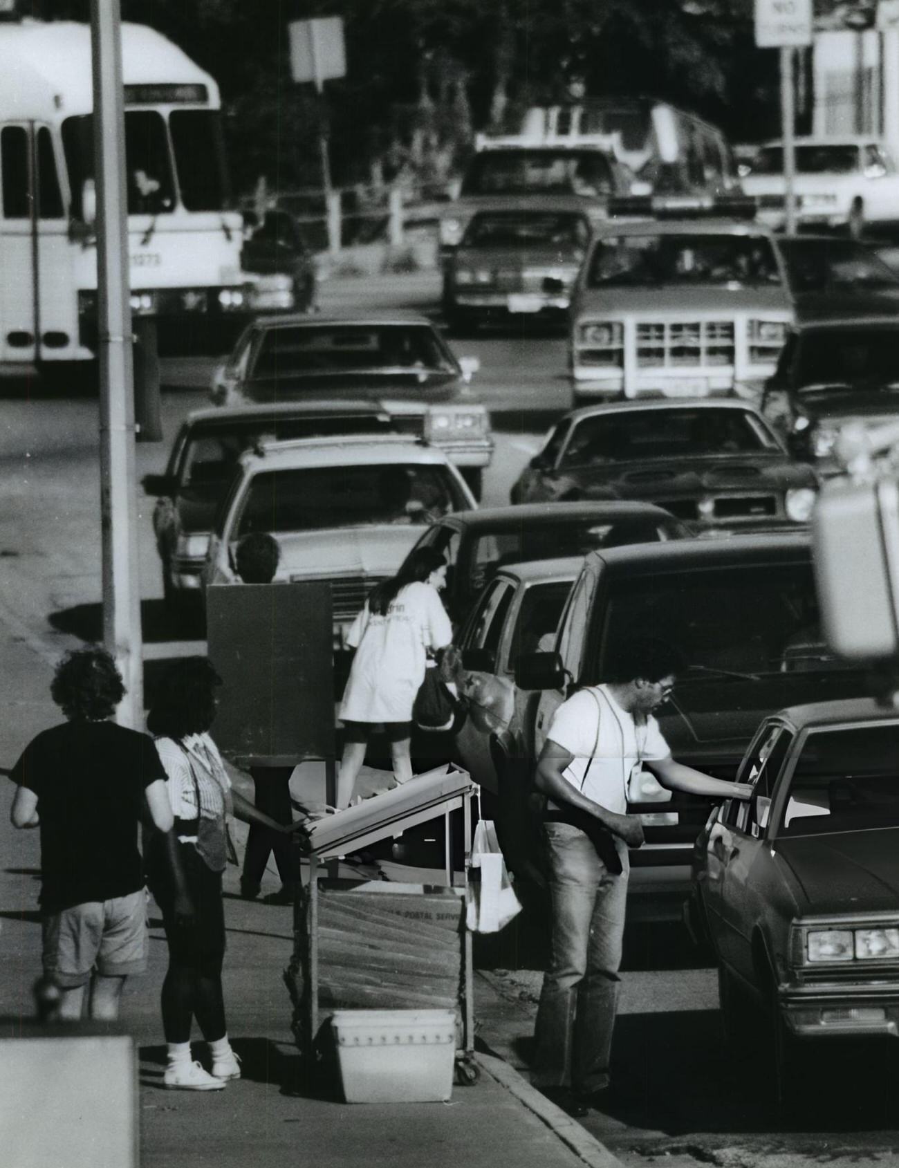 #15 Post Office employees efficiently collect IRS Forms from motorists, a snapshot of pre-digital tax filing, Houston, Texas.