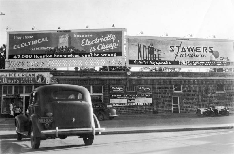 #25 Billboards on a grocery store roof, 1940s