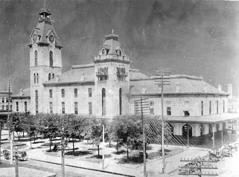 #22 City Hall, Houston, Texas, showing grounds and telephone poles, 1880s