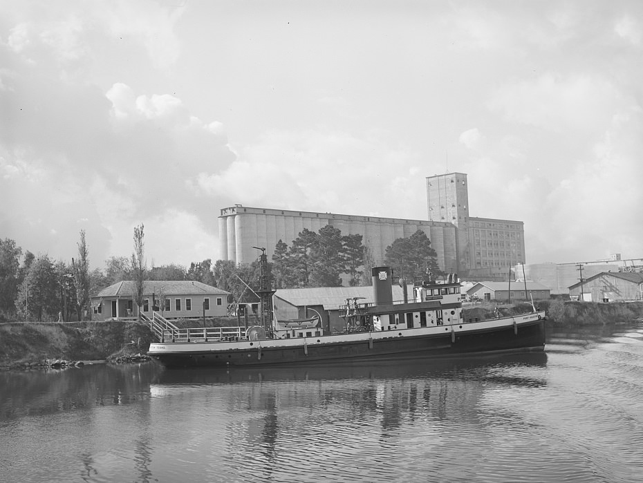 #63 Flour mill and tugboat at the Port of Houston, Texas, 1939
