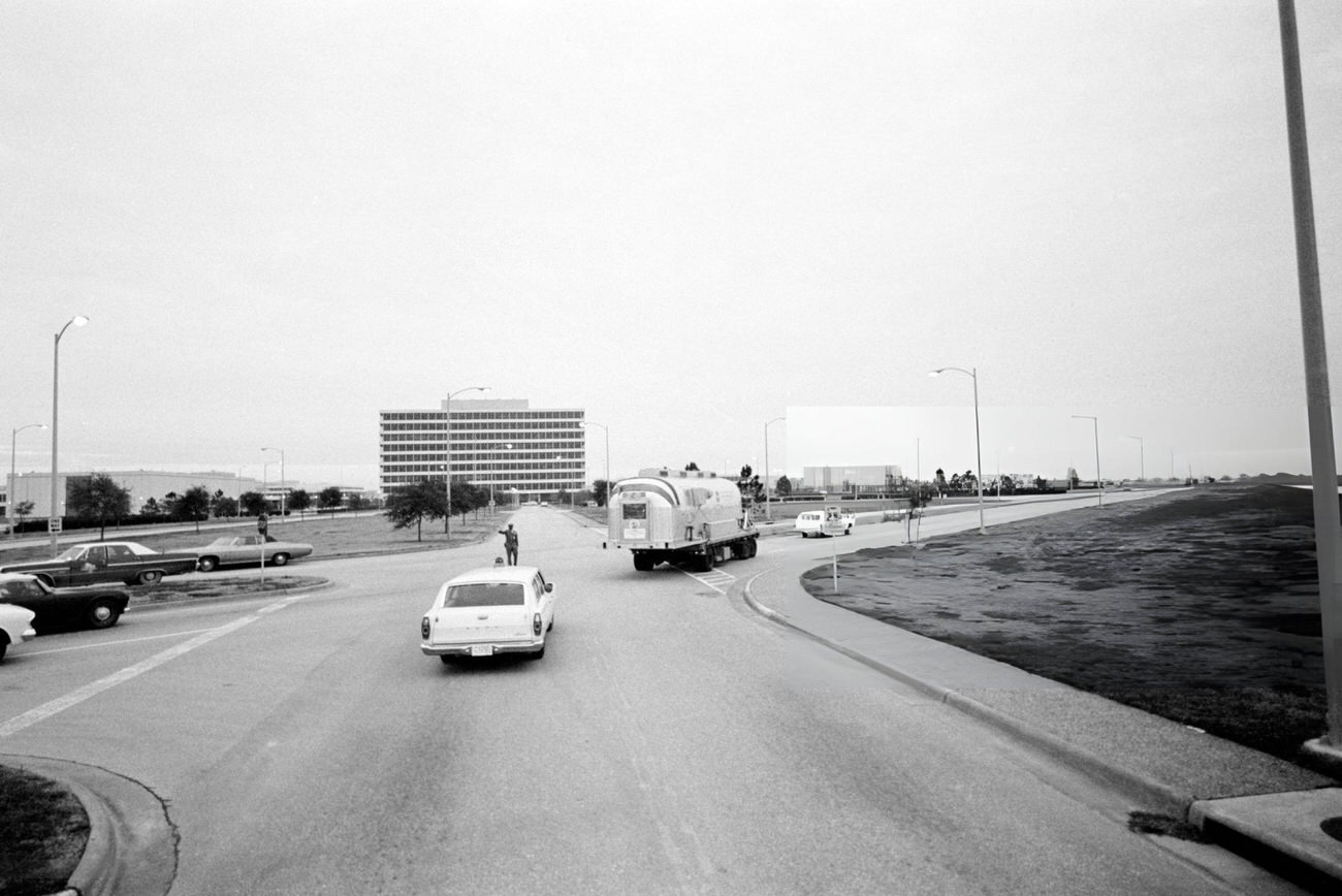 #69 The Apollo 12 crew arrives in the Mobile Quarantine Facility at the Manned Spacecraft Center, Houston, Texas, 1969.