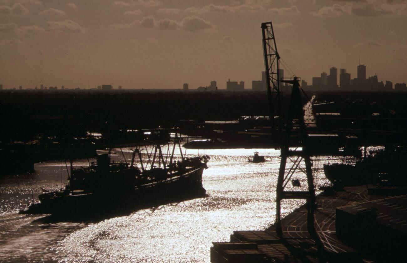 #42 Houston Ship Channel at dusk with downtown skyline in the background, 1973.