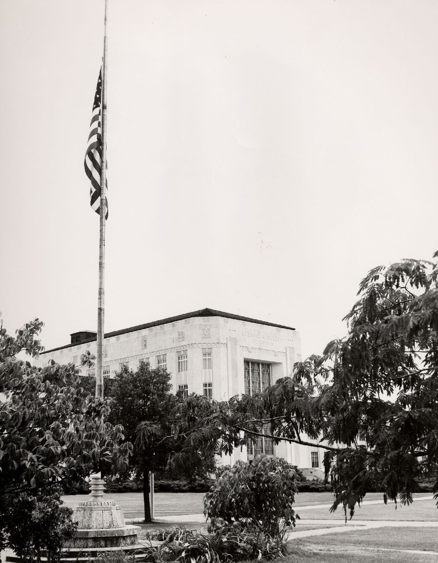 #47 American flag at half-staff at Ezekiel Cullen Building, 1957