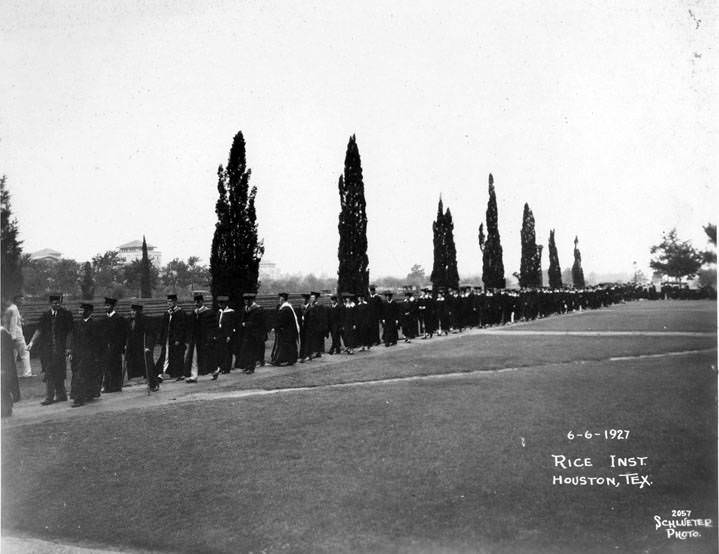 #31 Rice Institute graduates walking to ceremony, Houston, June 6, 1927.