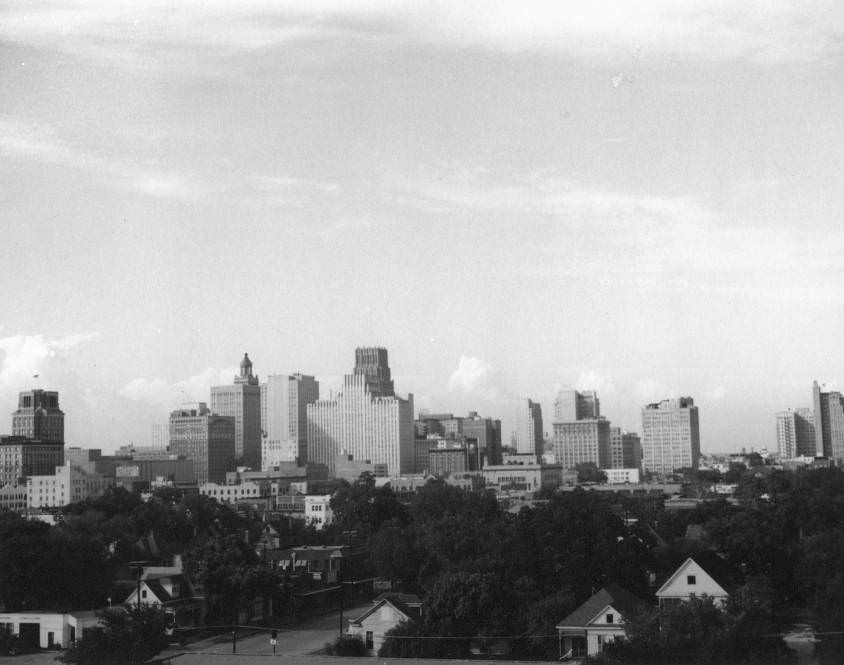 #11 Downtown Houston skyline and nearby houses, 1950s