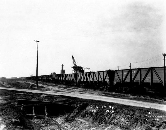 #41 Long line of railroad boxcars, Texas, February 1924.