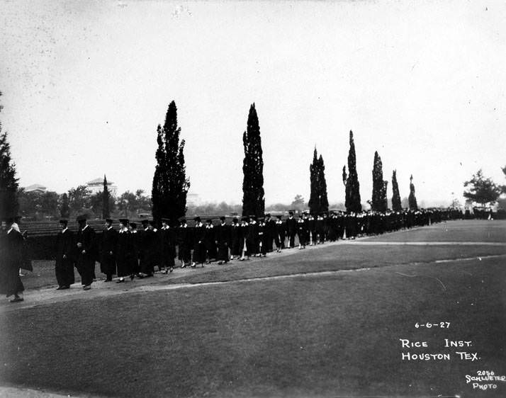 #43 Rice Institute graduates walking to graduation, Houston, 1927.