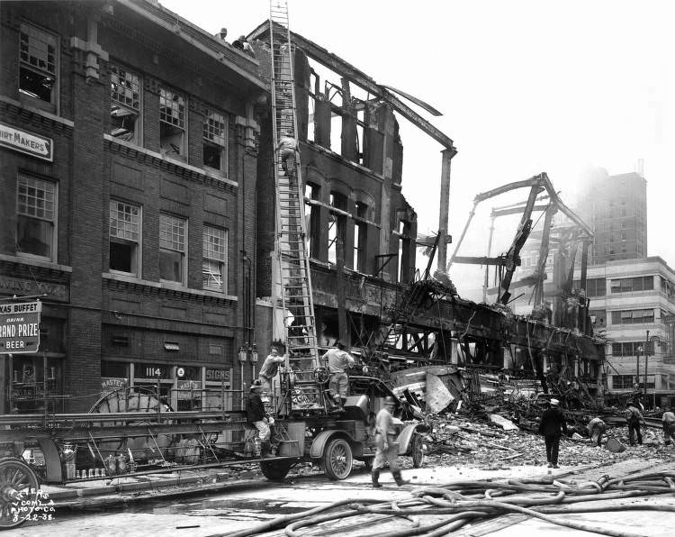 #38 Firefighters at burned store, Houston, 1938.