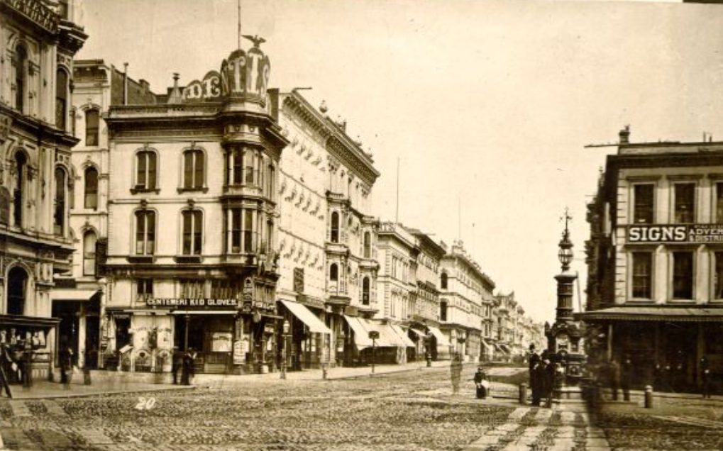 #31 West side of Kearny Street, north from Lotta’s Fountain, 1870