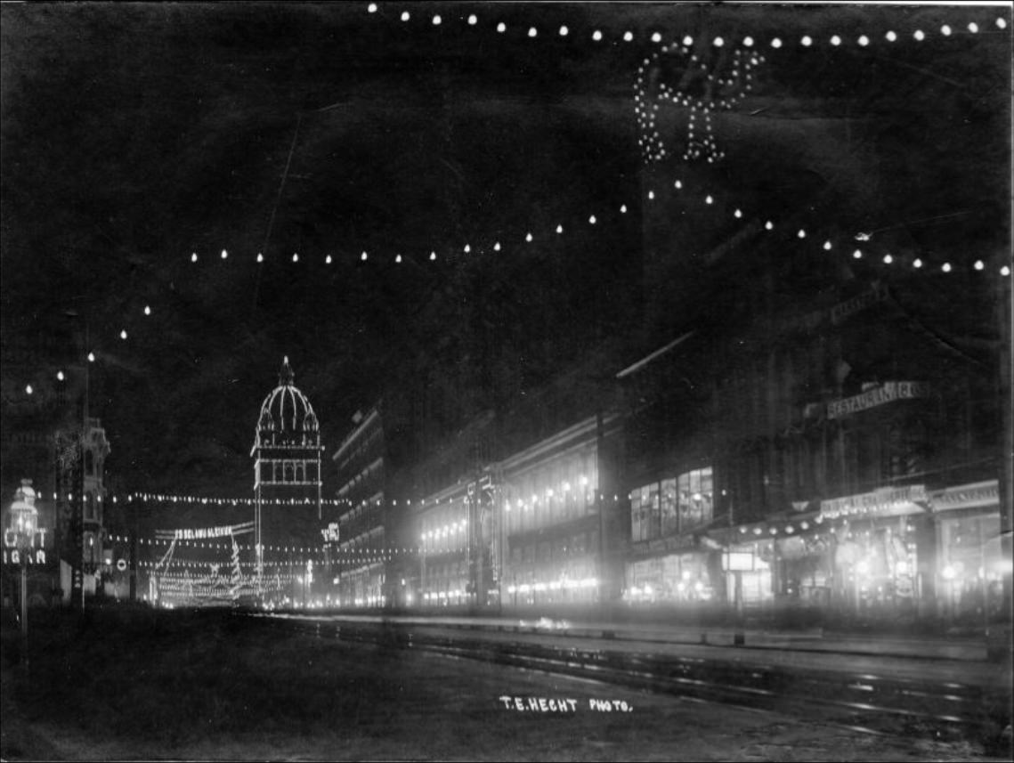 #126 Nighttime view of illuminated decorations on Market Street, near 5th Street, circa 1902
