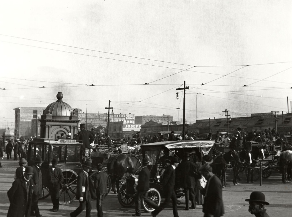#101 Horse-drawn carriages in front of the Ferry Building, circa 1915.
