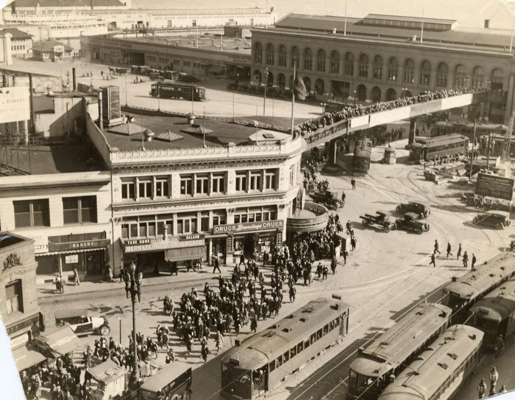 #140 Commuters exiting the Ferry Building, 1924