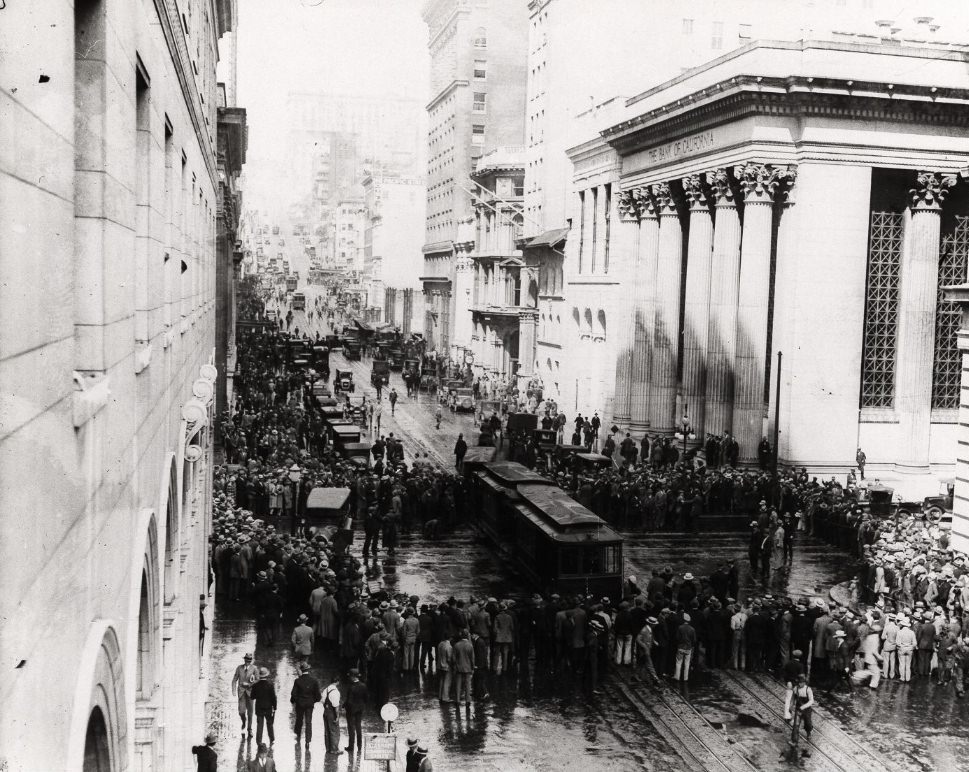 #44 Group of people gathering around a cable car on Montgomery and California Street in 1926.