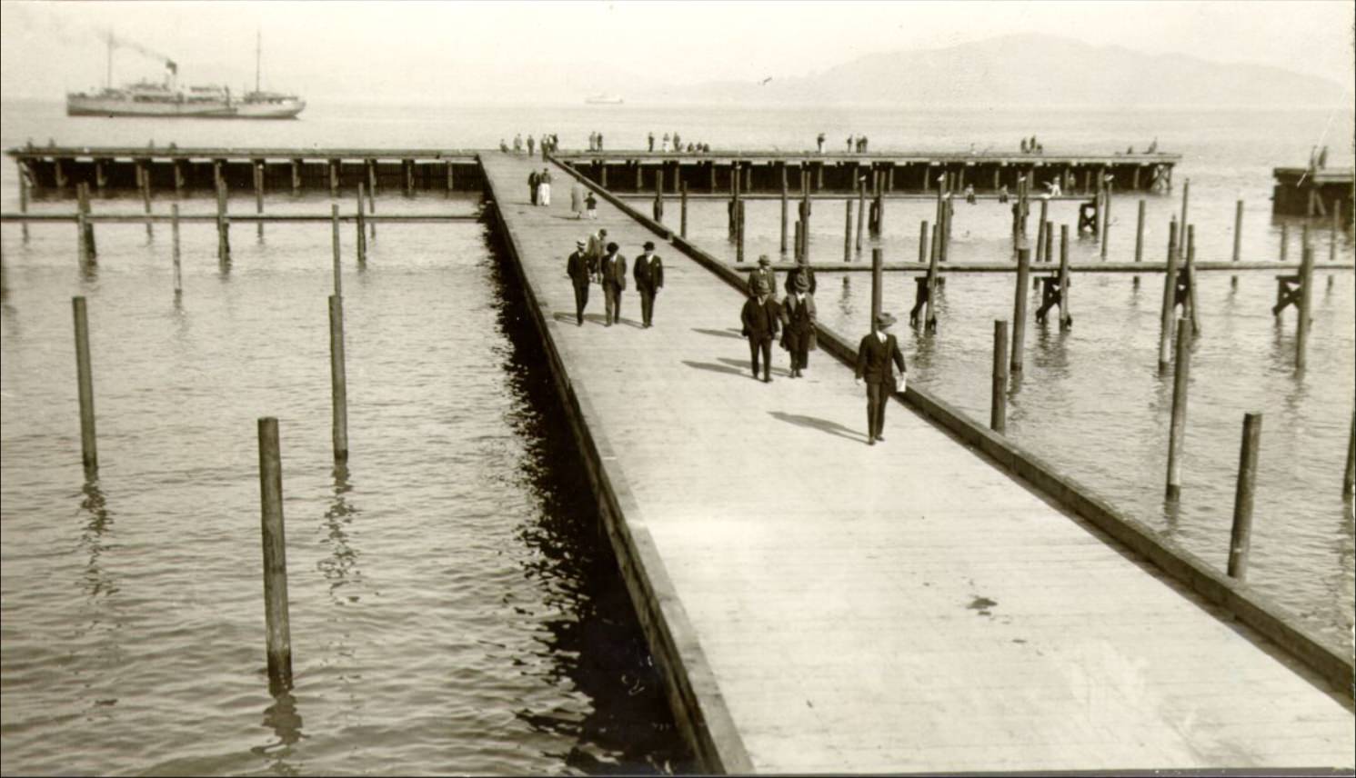 #69 Captain P. B. Lamb, Charles S. Tripler, and Mark Fontana at the Marina Yacht Harbor, 1920s