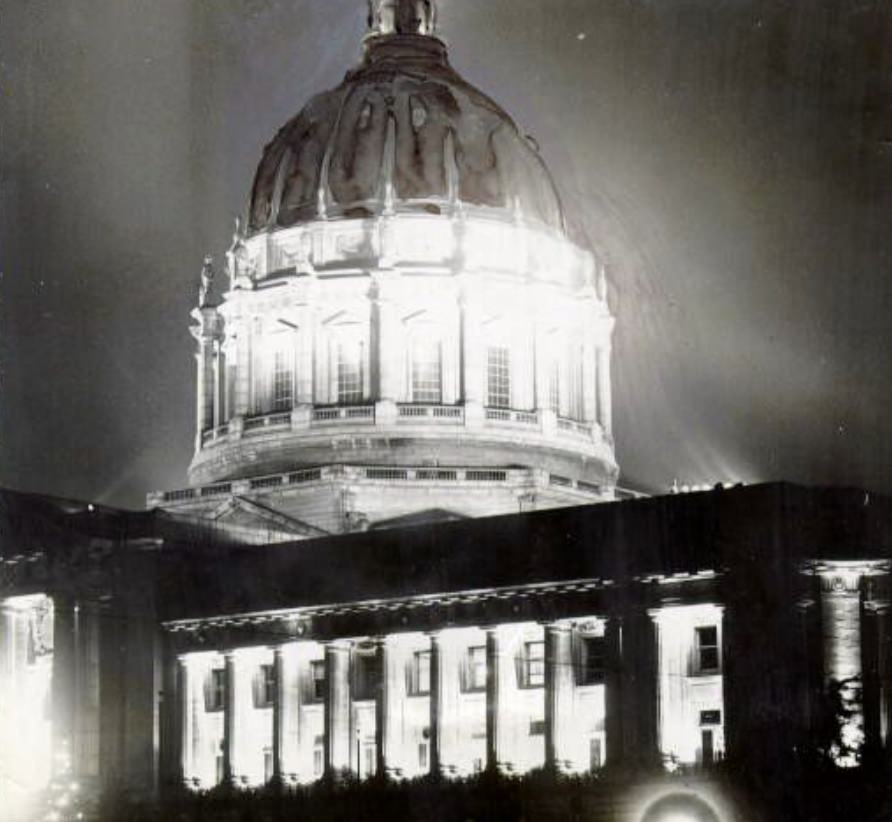 #85 City Hall illuminated at night in 1929.