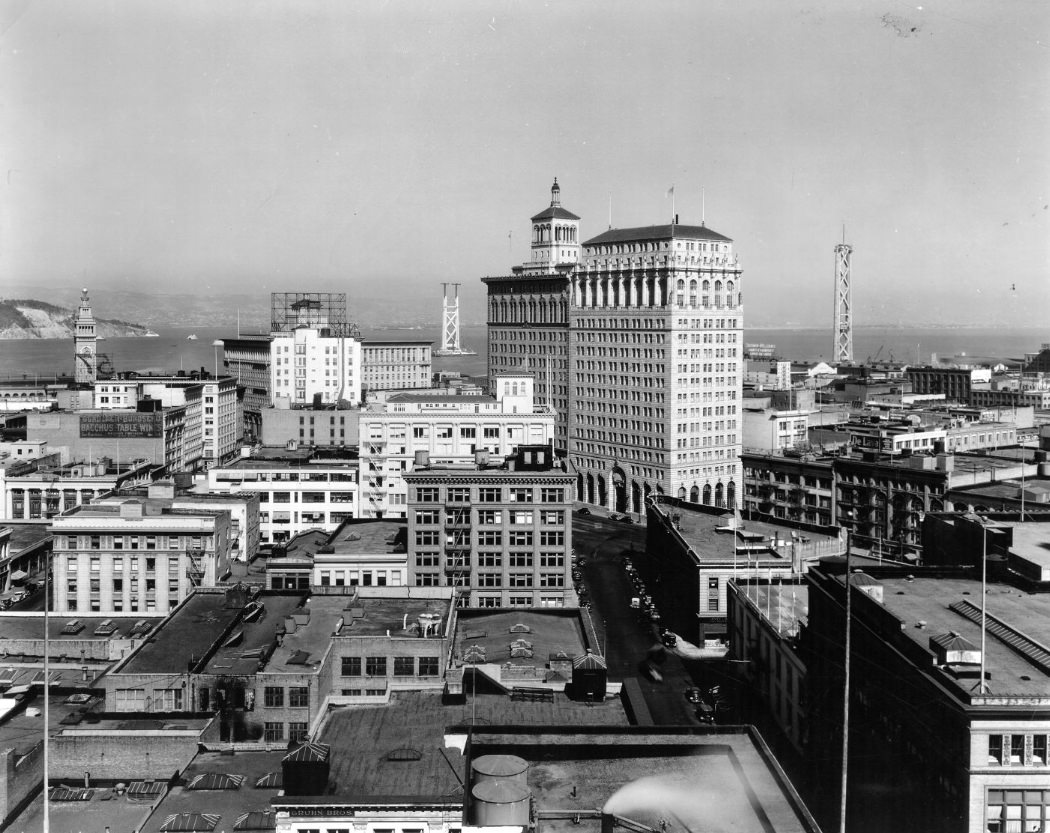 #73 View of San Francisco and Bay Bridge towers under construction, 1934