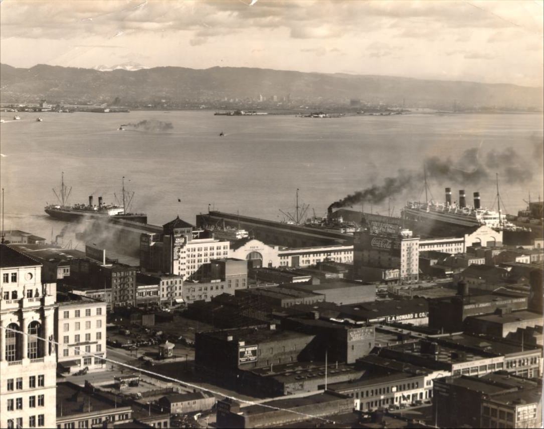 #97 View across the Bay towards the east with piers 18 and 20 in the foreground, 1930