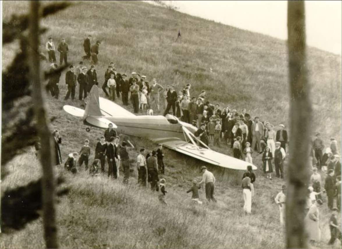#156 Crowd of people around a wrecked plane on Twin Peaks, 1938