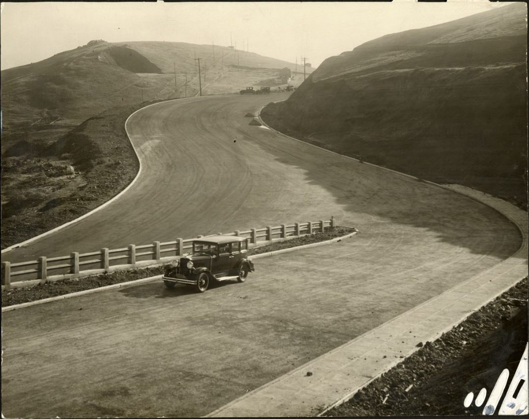 #169 Car driving on a Twin Peaks road, 1930