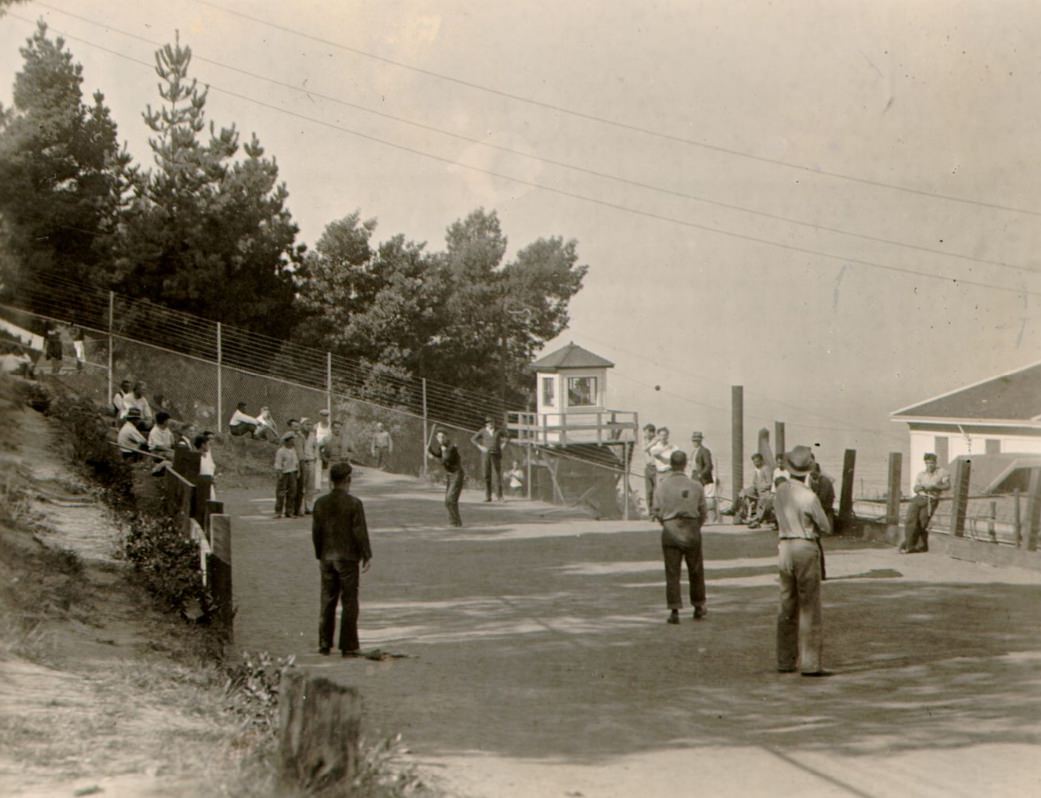 #183 Group of immigrants playing baseball on Angel Island, 1933