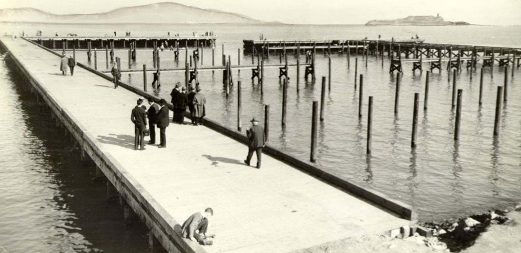 #49 People walking along the Marina pier, 1933
