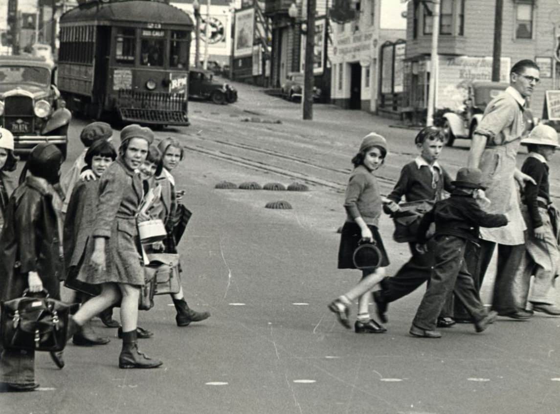 #95 Children being safely escorted across Geary and Cook Street, 1937
