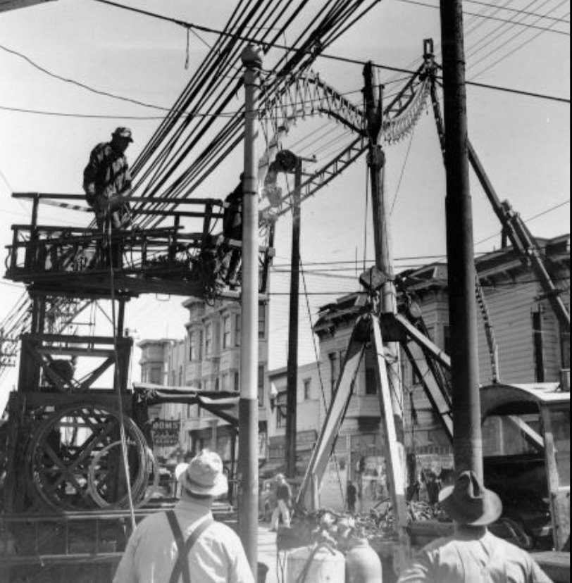 #126 Metal arches on Fillmore Street being dismantled for scrap metal, 1943