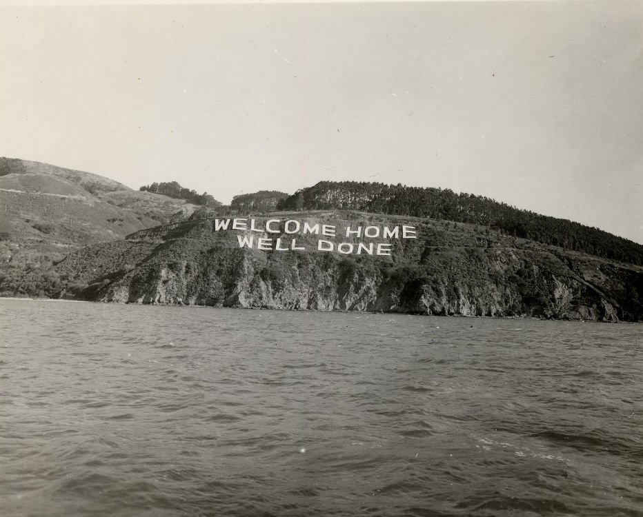 #127 ‘WELCOME HOME WELL DONE’ sign on Angel Island for WWII returnees, 1940s