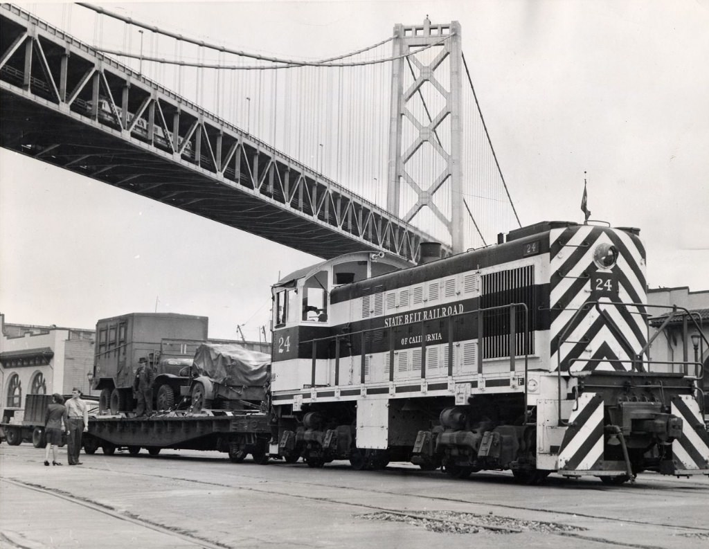 #18 Freight train stopped under the Bay Bridge at the San Francisco waterfront, 1946
