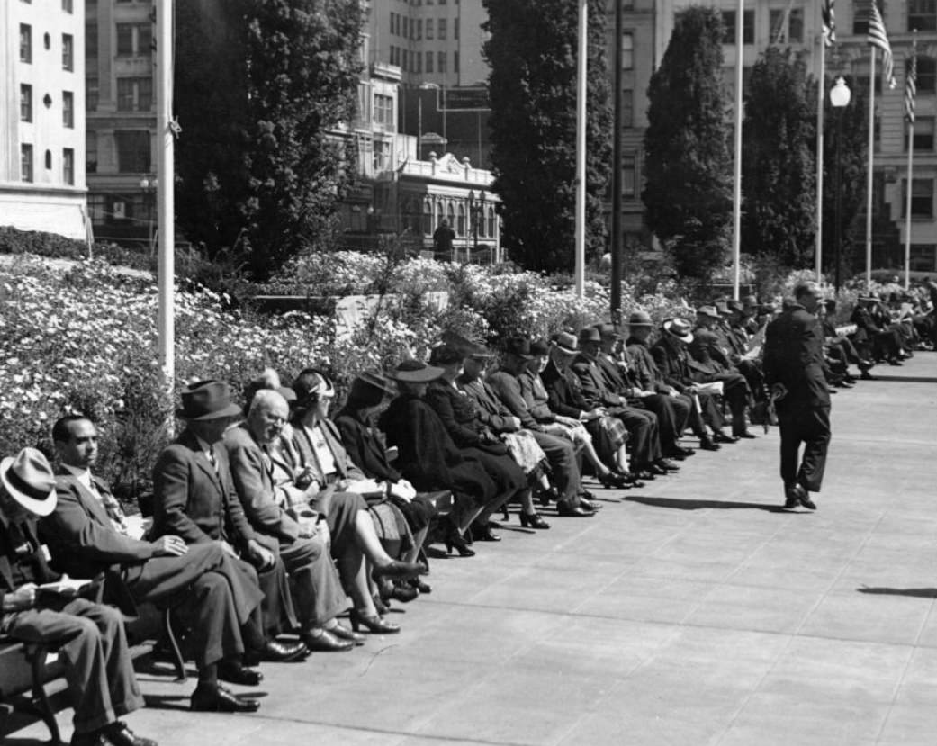 #17 Benches lined with people in Union Square, 1942