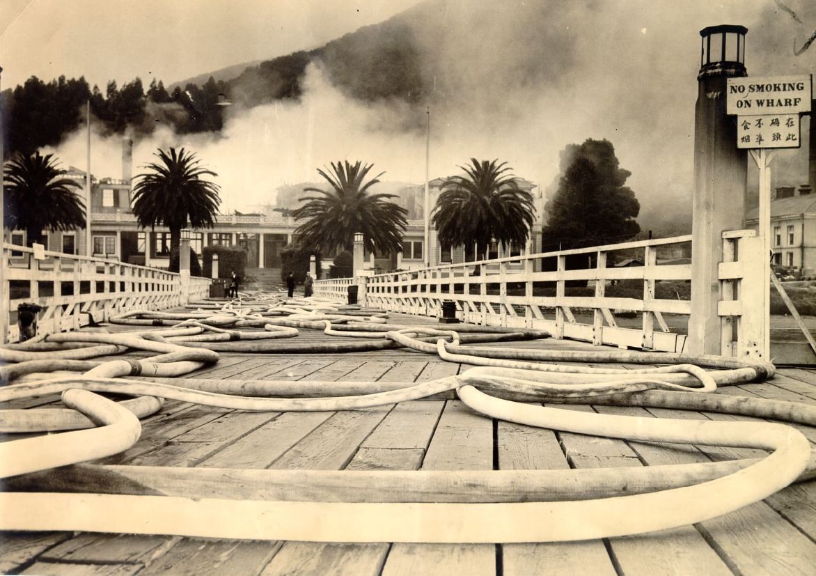 #57 Fire hoses on Angel Island wharf during blaze, 1940