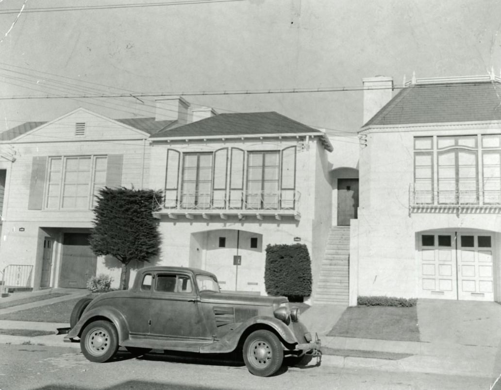 #224 Eleanor’s father’s car in front of their house, 1950