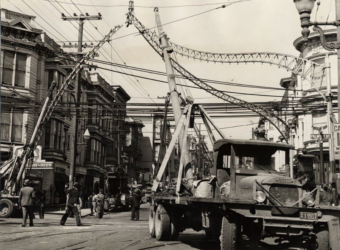 #71 Metal arches on Fillmore Street being dismantled for scrap metal, 1943
