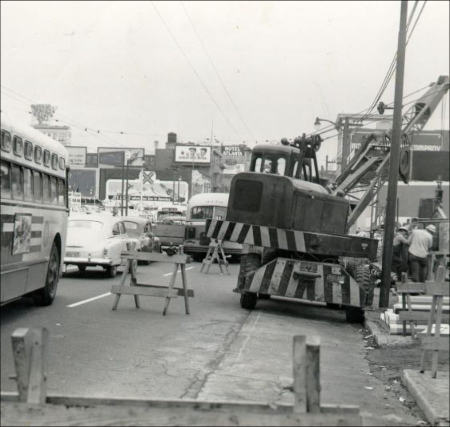 #124 P.G.& E. workers installing equipment at 8th and Mission Streets, 1953.
