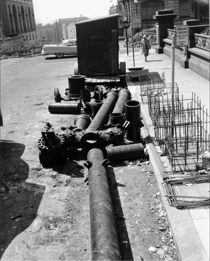 #137 Water pipes at the intersection of Mason and California, 1957.