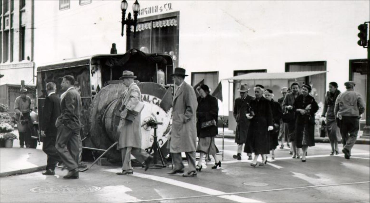 #17 Construction on a pedestrian crosswalk at Stockton and Geary Streets, 1955.
