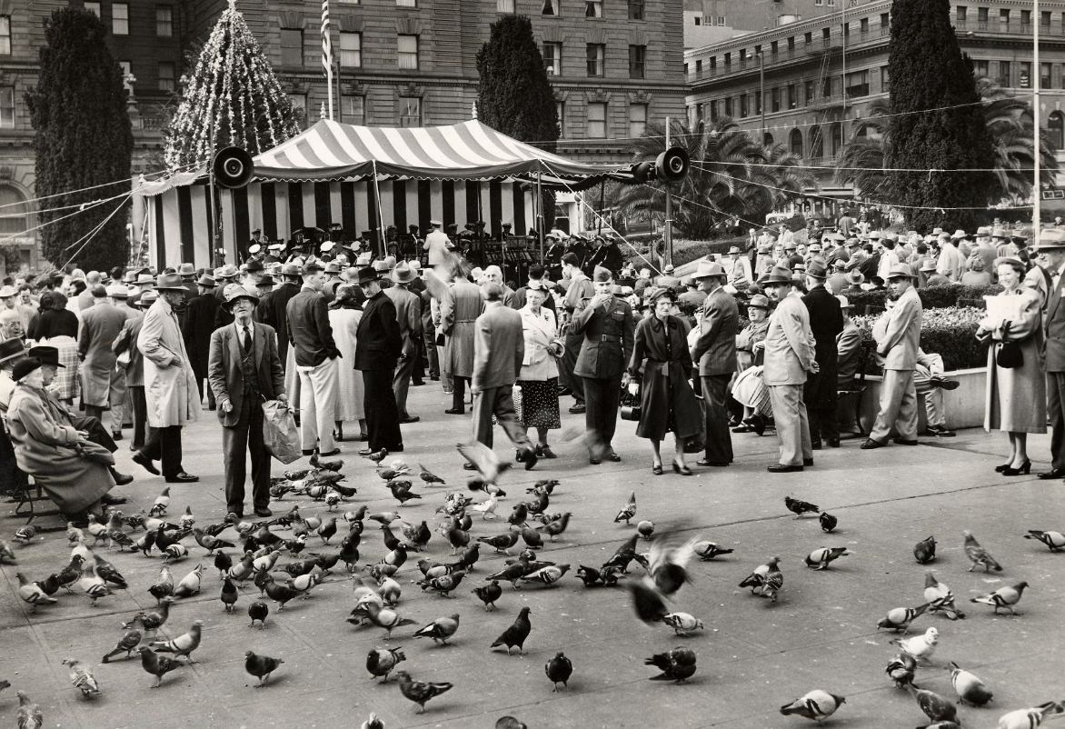#222 People gather in Union Square to listen to the Golden Gate Park band, 1953.