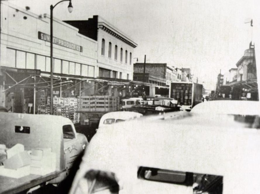 #28 Streets outside the Commission District produce market congested, 1956.