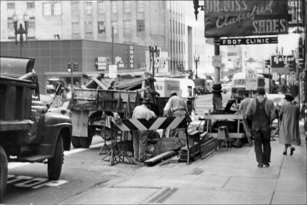 #6 PG&E workers block a pedestrian crosswalk at Sutter and Powell Streets, 1955.