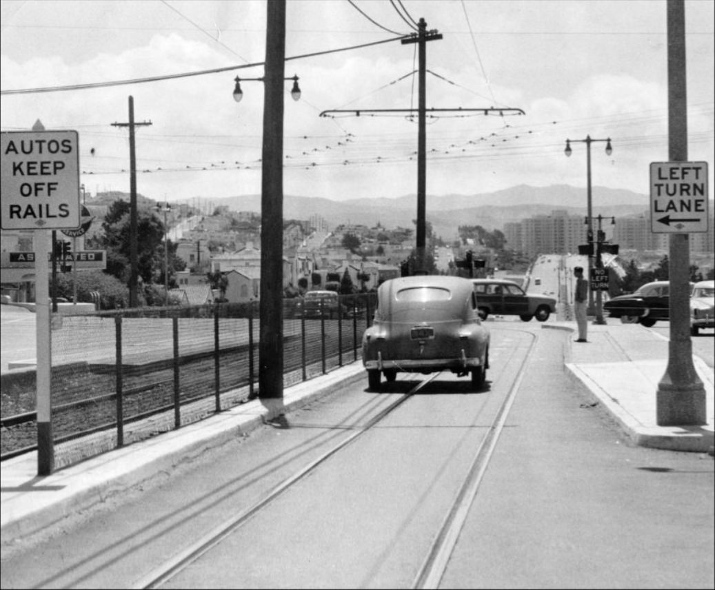 #84 Confusing signs at Ocean Avenue and Junipero Serra Boulevard, 1953.