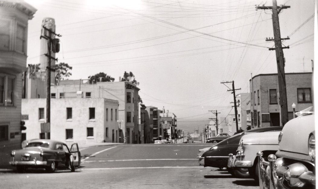 #94 Looking north from Union and Montgomery Street with Coit Tower in the background, 1952.