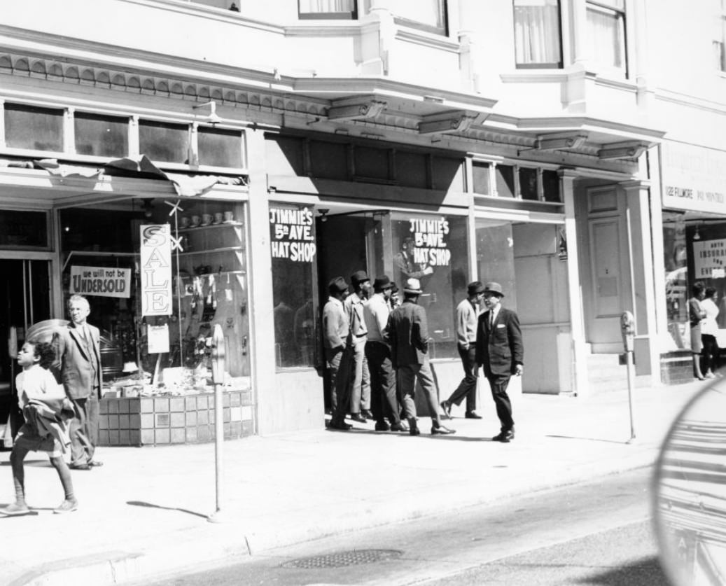 #158 Men outside Jimmie’s 5th Ave. Hat Shop on Fillmore Street, 1964.