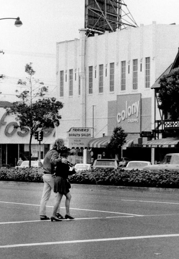 #174 Two crossing Geary Boulevard in the Richmond District, 1969.