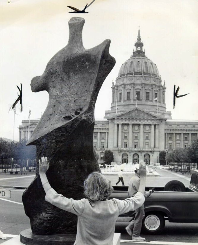 #15 Laurie MacTavish admiring ‘Winged Figure’ by Henry Moore, Civic Center Plaza, 1963.