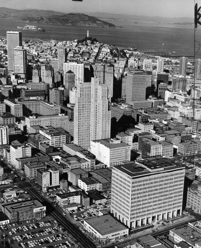 #45 Aerial view of San Francisco near Folsom Street, looking north with Coit Tower and Alcatraz visible, 1965.