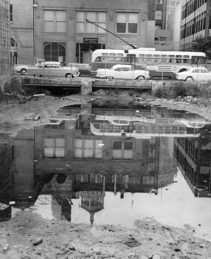 #59 Pool of water in a vacant lot on Sacramento and Drumm Street, 1963.