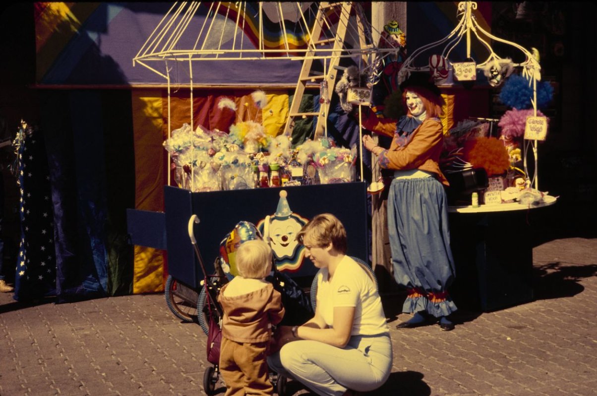 #87 Clown vendor with customers at Pier 39, 1984.