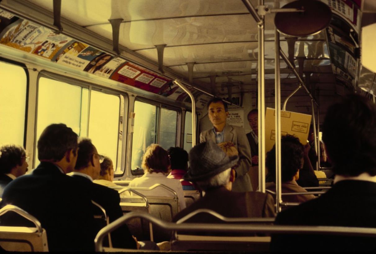 #94 People boarding a Muni bus, 1984.