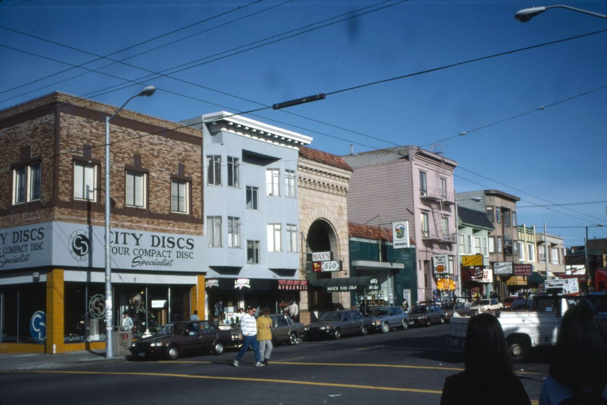 #21 Clement Street at 7th Avenue, City Discs, Legends, Top’s Auto Gift Shop, Max’s 540 Club, 1992.