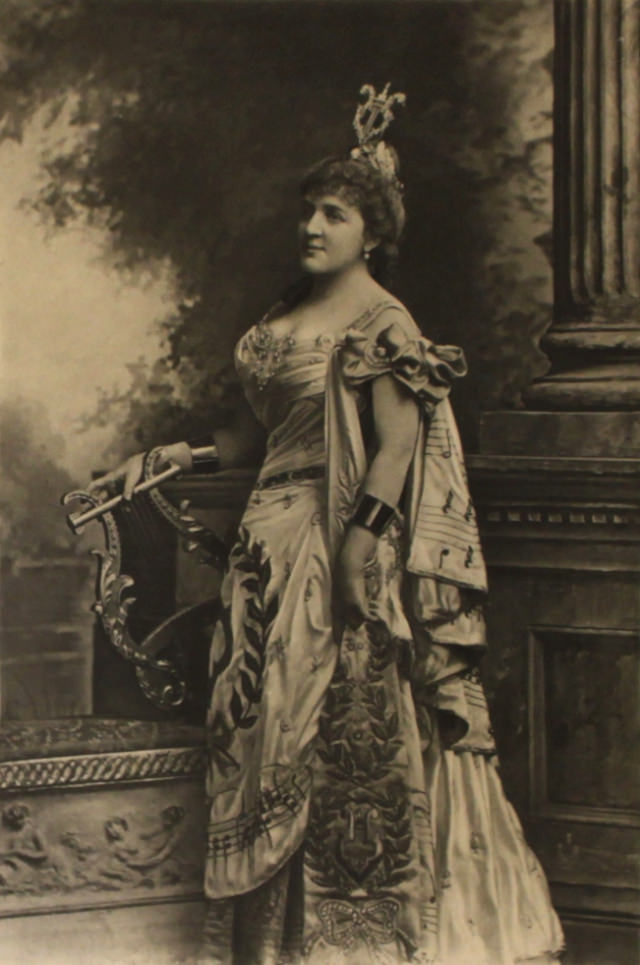 #12 Mrs Ronalds as Euterpe the Muse of music – her costume has many clues to her identity.